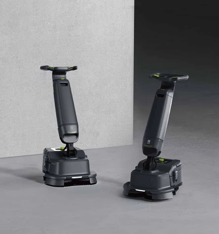 Deux autolaveuses verticales PUDU SH1 — visuel officiel PUDU Robotics